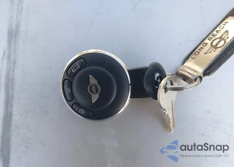 2009 Mini Cooper S z USA, uszkodzony, nr VIN WMWMF73579TW81718